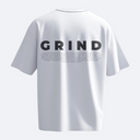 White t-shirt with 'GRIND' printed on the back against a white background